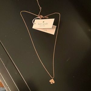 KATE SPADE brand new with tags rose gold colored necklace.